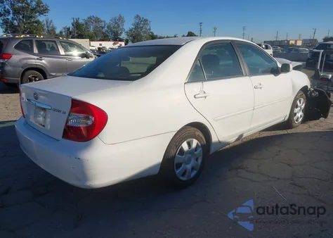 2003 Toyota Camry Le z USA, uszkodzony, nr VIN 4T1BE32K23U123687